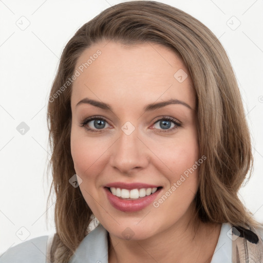 Joyful white young-adult female with medium  brown hair and blue eyes