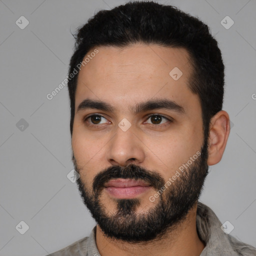 Neutral latino young-adult male with short  black hair and brown eyes