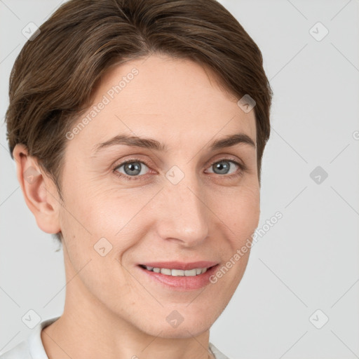 Joyful white young-adult female with short  brown hair and grey eyes