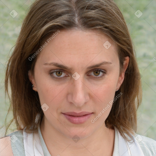 Joyful white young-adult female with medium  brown hair and blue eyes