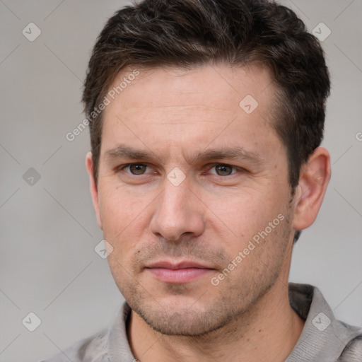 Neutral white adult male with short  brown hair and brown eyes