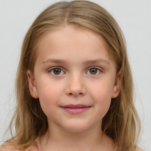 Joyful white child female with medium  brown hair and brown eyes