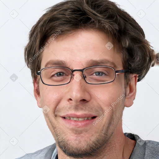 Joyful white adult male with short  brown hair and grey eyes