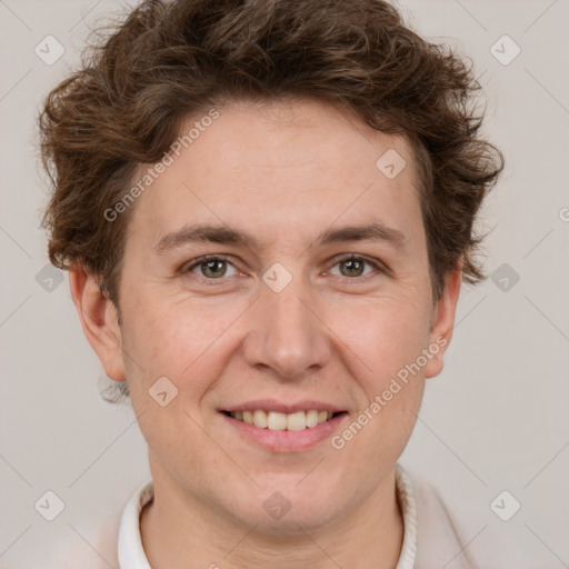 Joyful white adult female with short  brown hair and brown eyes