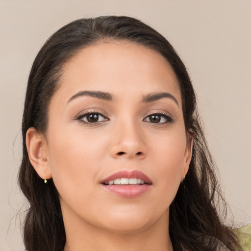 Joyful white young-adult female with long  brown hair and brown eyes