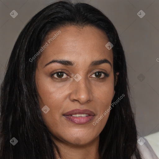 Joyful black young-adult female with long  brown hair and brown eyes