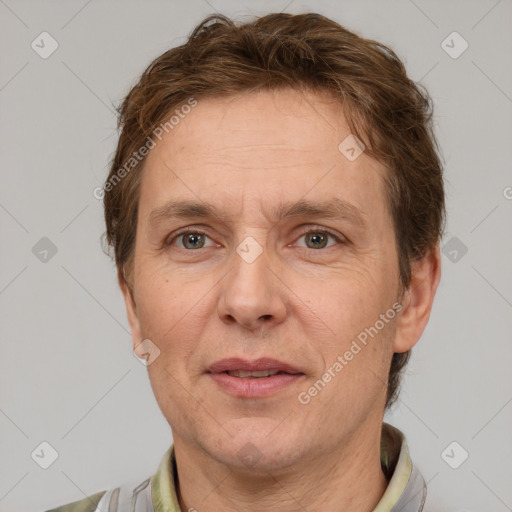 Joyful white adult male with short  brown hair and grey eyes