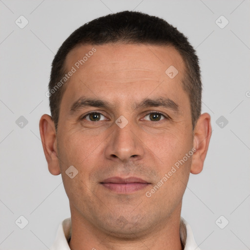 Joyful white adult male with short  brown hair and brown eyes