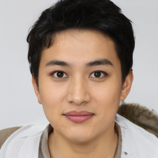 Joyful white young-adult female with short  black hair and brown eyes