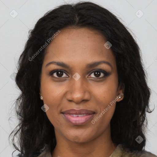 Joyful black young-adult female with long  brown hair and brown eyes