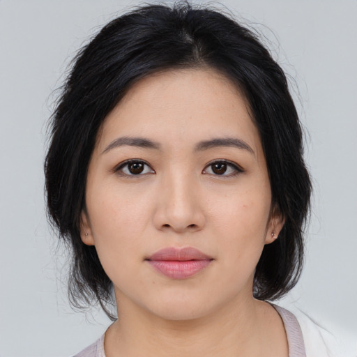 Neutral asian young-adult female with medium  black hair and brown eyes