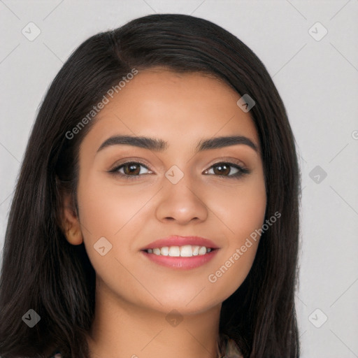 Joyful latino young-adult female with long  black hair and brown eyes