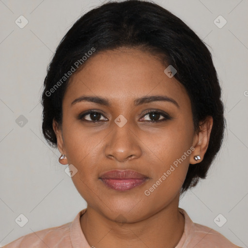 Joyful black young-adult female with medium  black hair and brown eyes