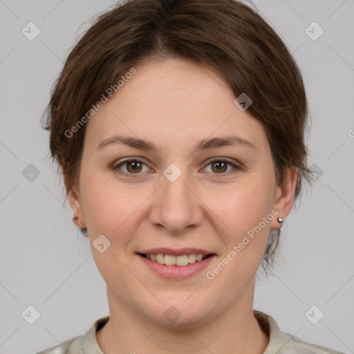 Joyful white young-adult female with medium  brown hair and grey eyes