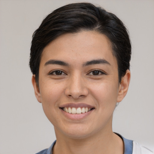 Joyful white young-adult female with short  brown hair and brown eyes