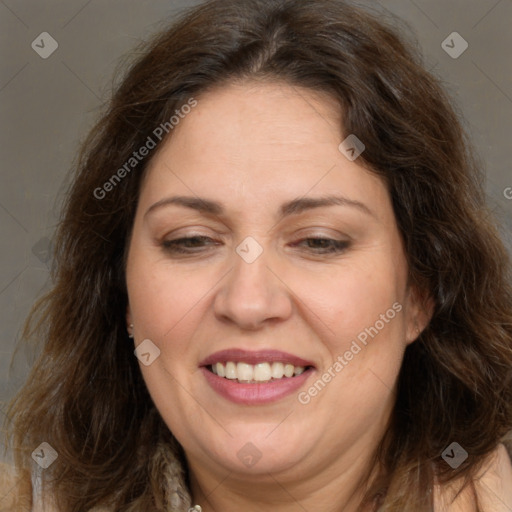 Joyful white adult female with long  brown hair and brown eyes