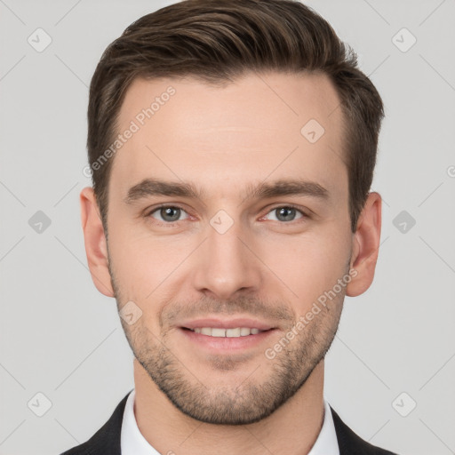 Joyful white young-adult male with short  brown hair and brown eyes