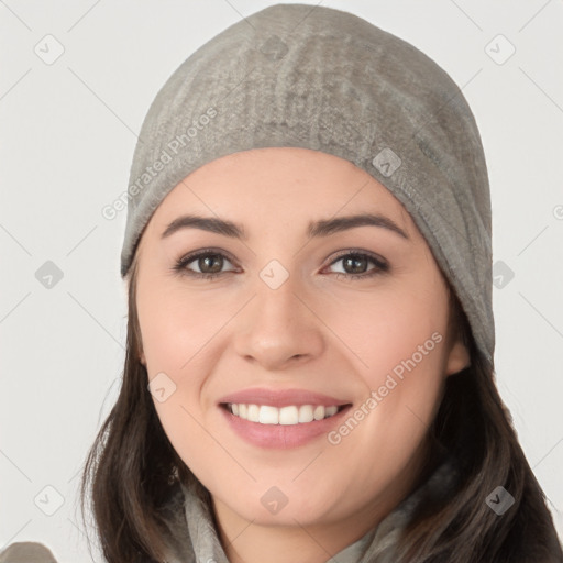 Joyful white young-adult female with long  black hair and brown eyes