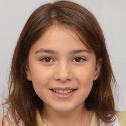 Joyful white child female with medium  brown hair and brown eyes