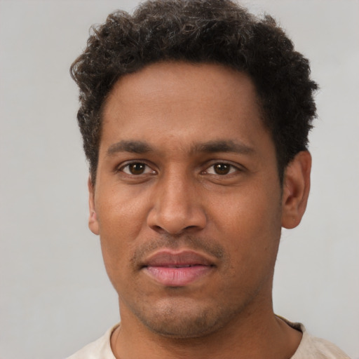 Neutral black young-adult male with short  brown hair and brown eyes
