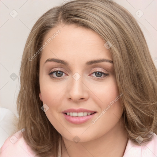 Joyful white young-adult female with long  brown hair and blue eyes