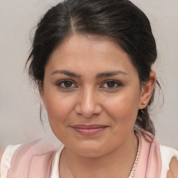 Joyful white young-adult female with medium  brown hair and brown eyes