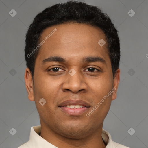 Joyful latino young-adult male with short  brown hair and brown eyes