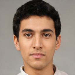 Neutral white young-adult male with short  black hair and brown eyes