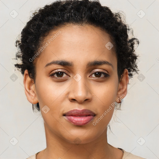 Joyful latino young-adult female with short  brown hair and brown eyes