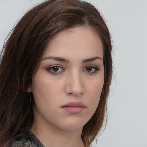 Neutral white young-adult female with long  brown hair and brown eyes