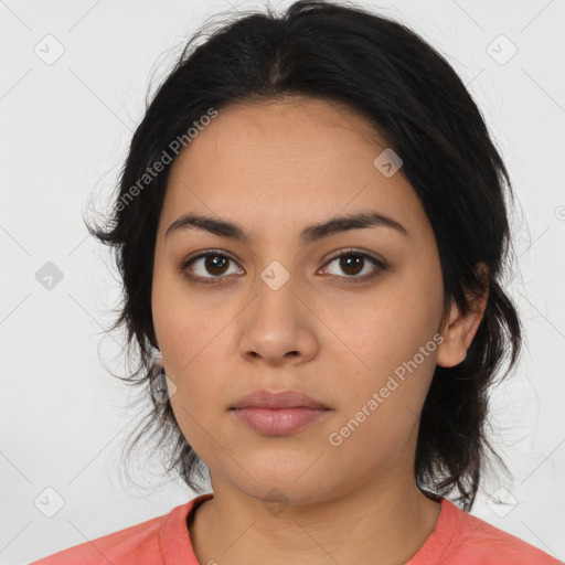 Neutral latino young-adult female with medium  brown hair and brown eyes