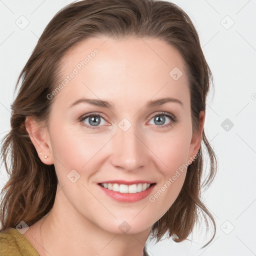 Joyful white young-adult female with medium  brown hair and blue eyes