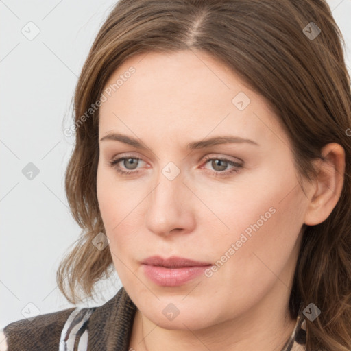 Neutral white young-adult female with medium  brown hair and grey eyes