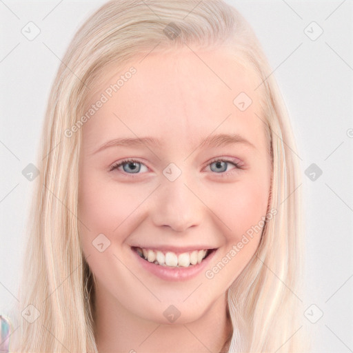 Joyful white young-adult female with long  blond hair and blue eyes