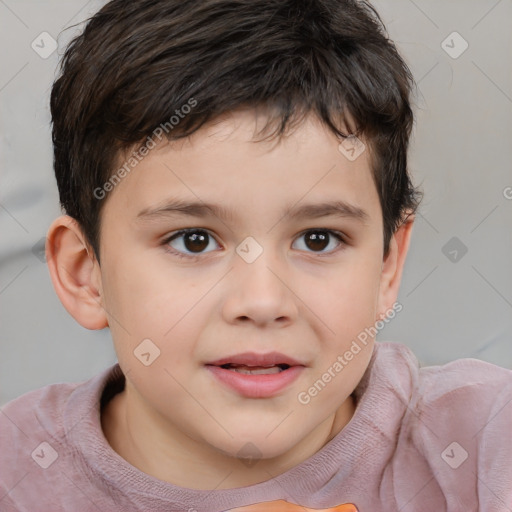 Joyful white child male with short  brown hair and brown eyes