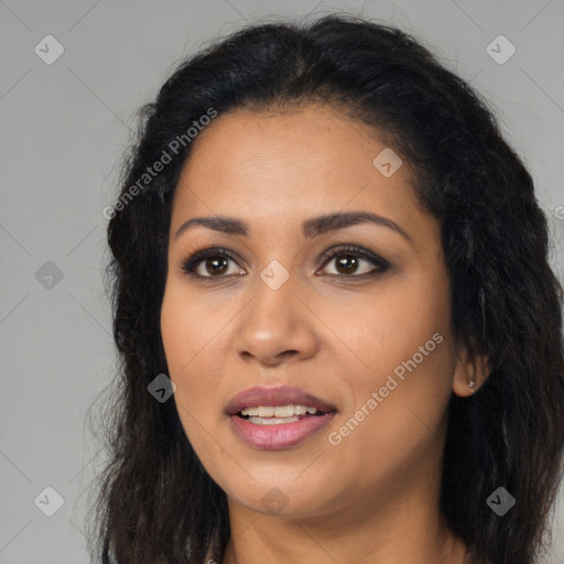 Joyful latino young-adult female with long  black hair and brown eyes