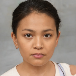 Neutral white young-adult female with short  brown hair and brown eyes
