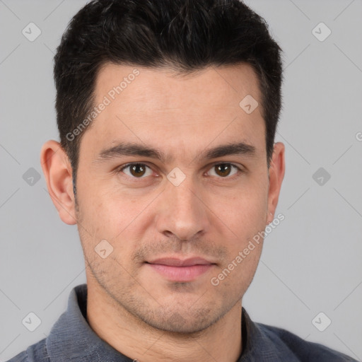 Joyful white young-adult male with short  brown hair and brown eyes