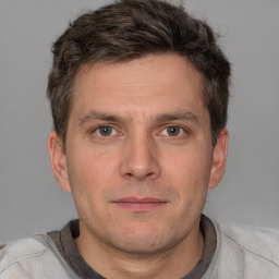Neutral white adult male with short  brown hair and brown eyes