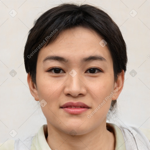 Joyful asian young-adult female with short  brown hair and brown eyes