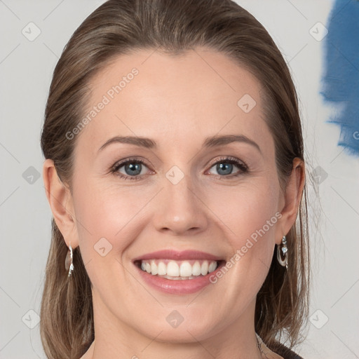 Joyful white young-adult female with medium  brown hair and grey eyes