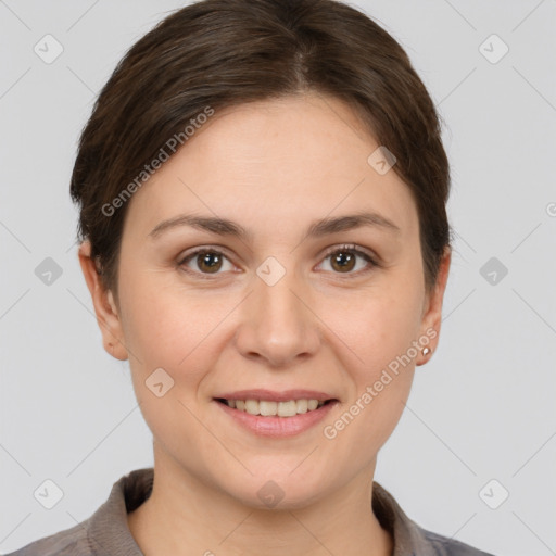 Joyful white young-adult female with short  brown hair and brown eyes