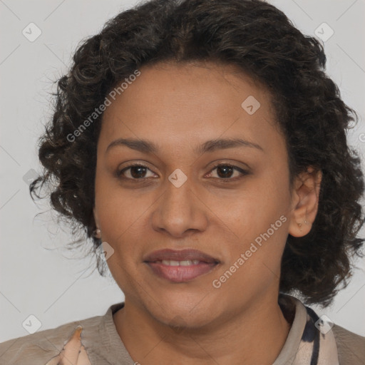 Joyful black young-adult female with medium  brown hair and brown eyes