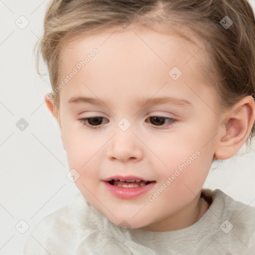 Joyful white child female with short  brown hair and brown eyes