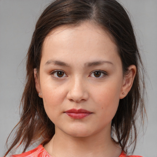 Neutral white young-adult female with medium  brown hair and brown eyes