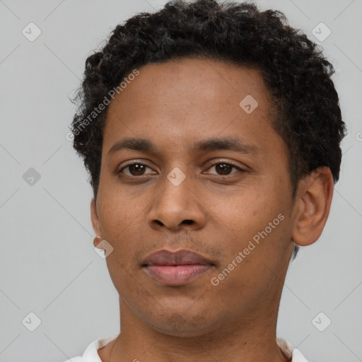 Neutral black young-adult male with short  brown hair and brown eyes