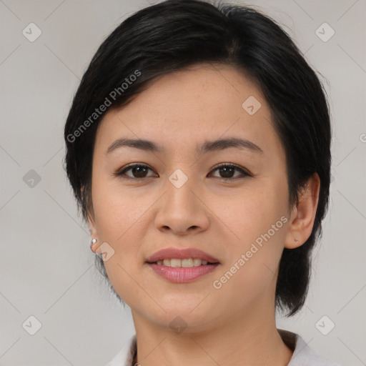 Joyful asian young-adult female with medium  black hair and brown eyes