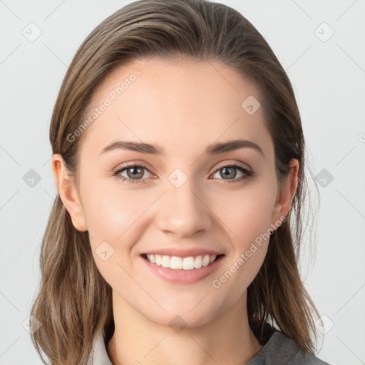 Joyful white young-adult female with long  brown hair and blue eyes