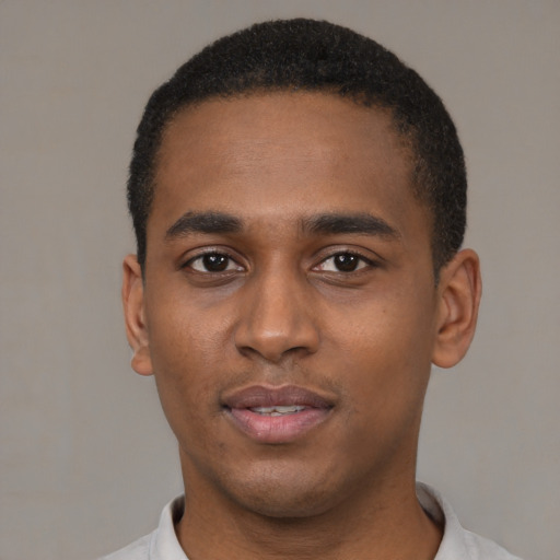 Neutral black young-adult male with short  black hair and brown eyes