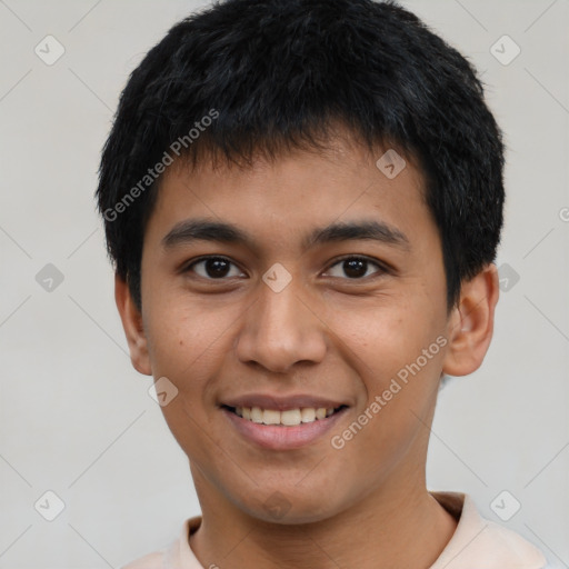 Joyful latino young-adult male with short  black hair and brown eyes